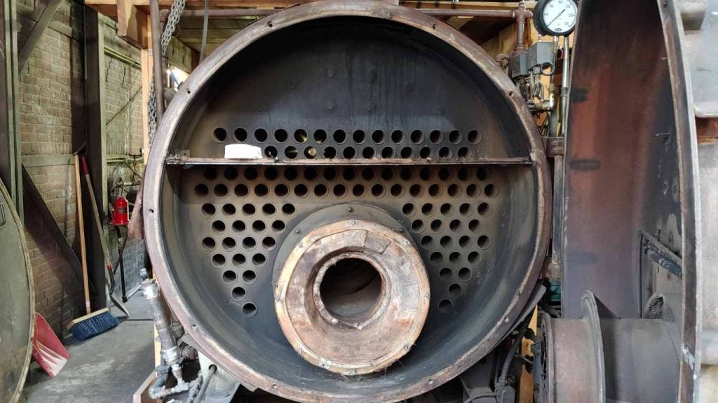 coded welding retubing service on industrial boiler