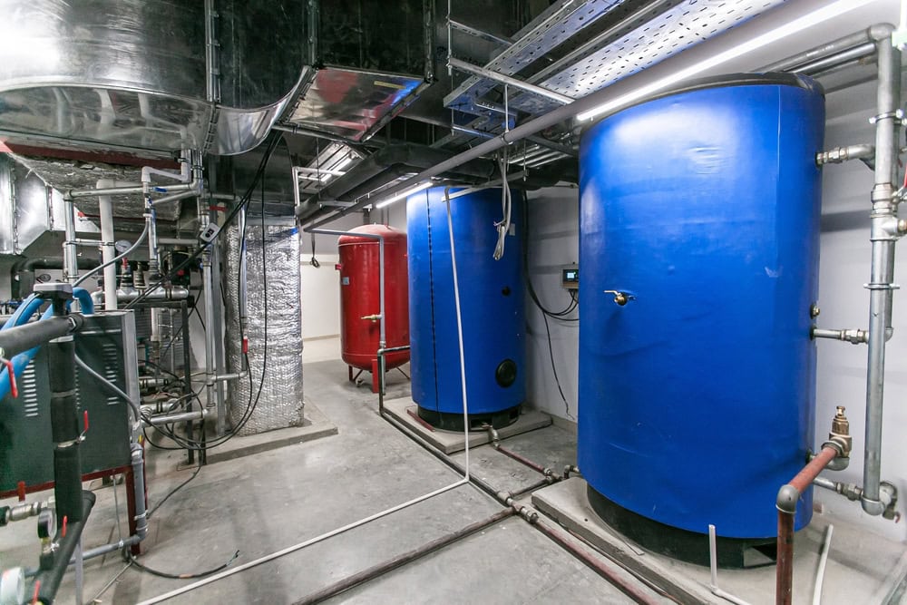 industrial boilers in a warehouse space