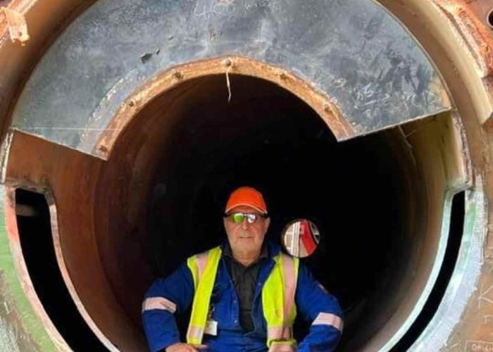 Man working on a site for coded welding services and industrial boilers